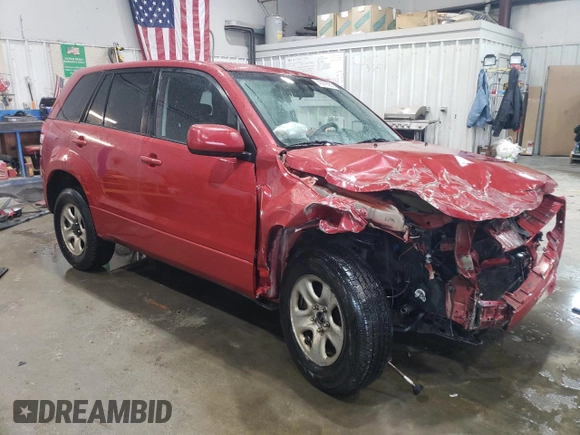 2011 Suzuki Grand Vitara Premium with VIN JS3TD0D25B4102081, listed as a Copart auction lot 43978955 with 310,535 mi miles and Salvage title. Bid and sale history available at DreamBid. Image 4.