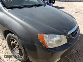 2004 Kia Spectra LX z VIN KNAFE122145052033, wystawiony jako Copart lot #47457493 z przebiegiem 148 663 mil mil oraz Czysty tytuł • Clean title. Historia ofert i sprzedaży dostępna na DreamBid. Obrazek 9.