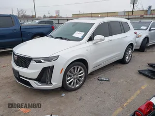 2021 Cadillac XT6 Premium Luxury z VIN 1GYKPCRSXMZ169206, wystawiony jako IAAI lot #41581841 z przebiegiem 64 789 mil mil oraz . Historia ofert i sprzedaży dostępna na DreamBid. Obrazek 17.