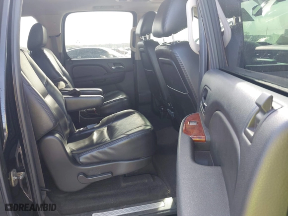 2011 Chevrolet Suburban LTZ with VIN 1GNSCKE03BR117338, listed as a IAAI auction lot 41878479 with 182,327 mi miles. Bid and sale history available at carsss.com. Image 8.
