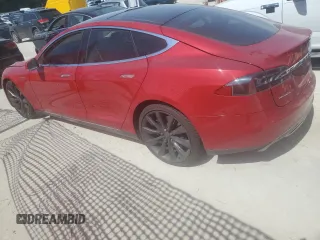 2014 Tesla Model S 60 z VIN 5YJSA1H19EFP27946, wystawiony jako Copart lot #61284625 z przebiegiem 109 147 mil mil oraz Szkoda całkowita • Salvage title. Historia ofert i sprzedaży dostępna na DreamBid. Obrazek 2.