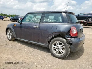 2012 MINI Hardtop z VIN WMWSU3C5XCT261707, wystawiony jako Copart lot #59939565 z przebiegiem 52 509 mil mil oraz Szkoda całkowita • Salvage title. Historia ofert i sprzedaży dostępna na DreamBid. Obrazek 2.