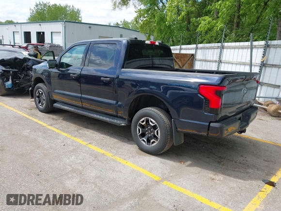 2023 Ford F-150 Lightning Pro with VIN 1FTVW1EL6PWG30061, listed as a IAAI auction lot 42362295 with 22,481 mi miles and . Bid and sale history available at DreamBid. Image 3.