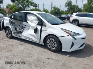 2016 Toyota Prius Four z VIN JTDKARFU7G3004950, wystawiony jako IAAI lot #42088702 z przebiegiem 431 897 mil mil oraz . Historia ofert i sprzedaży dostępna na DreamBid. Obrazek 1.