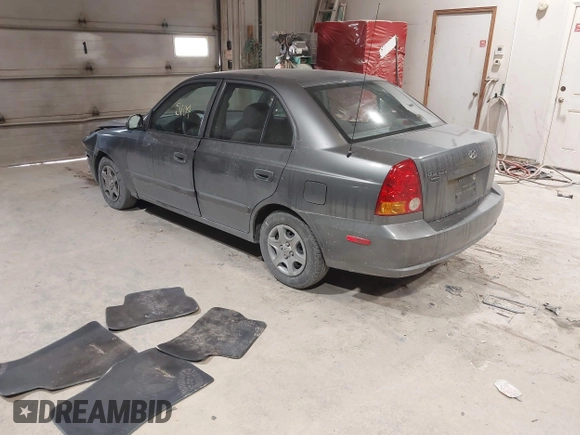 2004 Hyundai Accent GL with VIN KMHCG45C44U528783, listed as a IAAI auction lot 41535104 with 1 mi miles. Bid and sale history available at carsss.com. Image 3.
