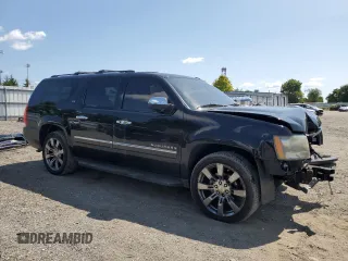 2011 Chevrolet Suburban LTZ with VIN 1GNSKKE38BR271945, listed as a Copart auction lot 68161164 with 199,788 mi miles and Salvage Title. Bid and sale history available at carsss.com. Image 4.