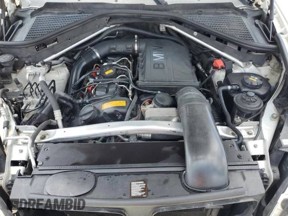 2012 BMW X5 35i с VIN 5UXZV4C58CL987049, выставлен на аукционе Copart как лот 61013925 с пробегом 167 508 миль миль и Чистый • Clean title. История ставок и продаж доступна на DreamBid. Изображение 12.