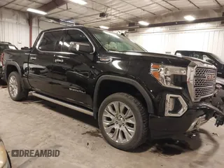 2022 GMC Sierra 1500 Limited Denali with VIN 1GTU9FEL6NZ166958, listed as a IAAI auction lot 41124252 with 54,266 mi miles. Bid and sale history available at carsss.com. Image 1.