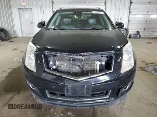 2014 Cadillac SRX Performance Collection with VIN 3GYFNFE34ES583362, listed as a Copart auction lot 61966535 with 145,954 mi miles and Non repairable. Bid and sale history available at DreamBid. Image 5.