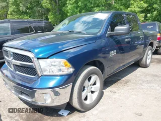 2021 Ram 1500 Tradesman z VIN 3C6RR6KG3MG713414, wystawiony jako IAAI lot #42115083 z przebiegiem 116 938 mil mil oraz . Historia ofert i sprzedaży dostępna na DreamBid. Obrazek 2.