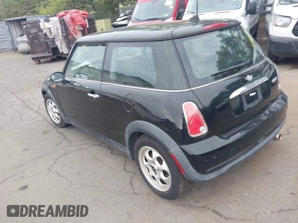 2005 MINI Hardtop with VIN WMWRC33535TJ70850, listed as a IAAI auction lot 42219720 with 66,398 mi miles and . Bid and sale history available at DreamBid. Image 3.