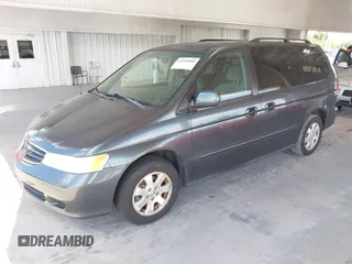 2004 Honda Odyssey EX with VIN 5FNRL18624B056333, listed as a IAAI auction lot 42143860 with 165,687 mi miles and . Bid and sale history available at DreamBid. Image 2.