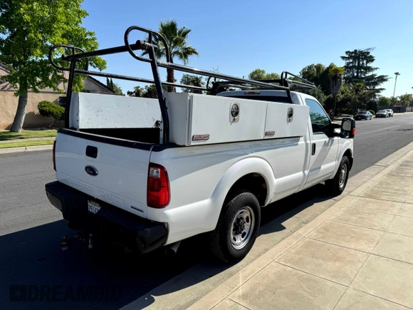 2014 Ford Super Duty F-250 SRW XL with VIN 1FTBF2A65EEA79309, listed as a Copart auction lot 54507845 with 224,094 mi miles and Clean Title. Bid and sale history available at carsss.com. Image 4.