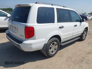 2003 Honda Pilot EX with VIN 2HKYF18583H537259, listed as a IAAI auction lot 42170726 with 319,752 mi miles and . Bid and sale history available at carsss.com. Image 4.