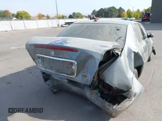 2004 Cadillac DeVille DHS z VIN 1G6KE57Y74U119605, wystawiony jako IAAI lot #40555057 z przebiegiem Nie podano mil oraz . Historia ofert i sprzedaży dostępna na DreamBid. Obrazek 16.