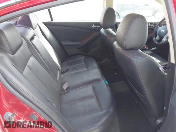 2009 Nissan Altima S z VIN 1N4AL21E09N558762, wystawiony jako IAAI lot #41600797 z przebiegiem 139 778 mil mil oraz . Historia ofert i sprzedaży dostępna na DreamBid. Obrazek 8.