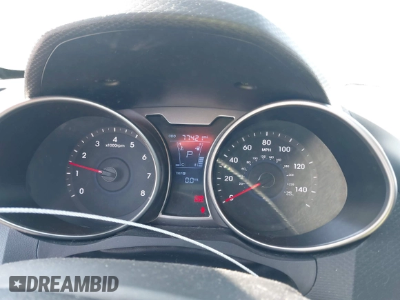 2014 Hyundai Veloster with VIN KMHTC6AD2EU214847, listed as a IAAI auction lot 42067728 with 77,421 mi miles. Bid and sale history available at carsss.com. Image 7.