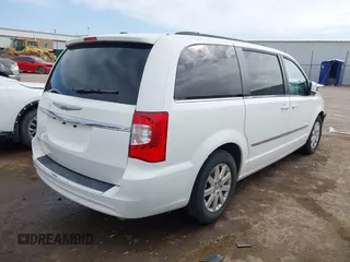 2013 Chrysler Town & Country Touring with VIN 2C4RC1BG3DR675173, listed as a IAAI auction lot 41744564 with 127,405 mi miles. Bid and sale history available at carsss.com. Image 4.