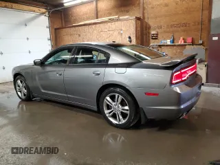2012 Dodge Charger SXT with VIN 2C3CDXJG1CH183855, listed as a Copart auction lot 53055585 with 181,682 mi miles and Salvage Title. Bid and sale history available at carsss.com. Image 2.