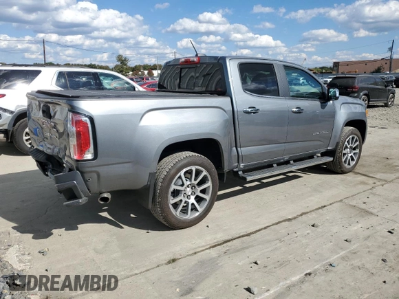 2022 GMC Canyon 4WD Denali with VIN 1GTG6EENXN1284835, listed as a Copart auction lot 75321594 with 7,419 mi miles and Salvage Title. Bid and sale history available at carsss.com. Image 3.
