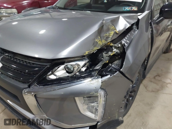 2019 Mitsubishi Eclipse Cross LE z VIN JA4AT4AA1KZ002066, wystawiony jako IAAI lot #41828510 z przebiegiem 56 217 mil mil oraz . Historia ofert i sprzedaży dostępna na DreamBid. Obrazek 6.