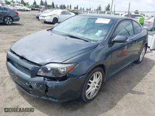 2006 Scion tC with VIN JTKDE177260081483, listed as a IAAI auction lot 42076072 with 156,556 mi miles. Bid and sale history available at carsss.com. Image 23.