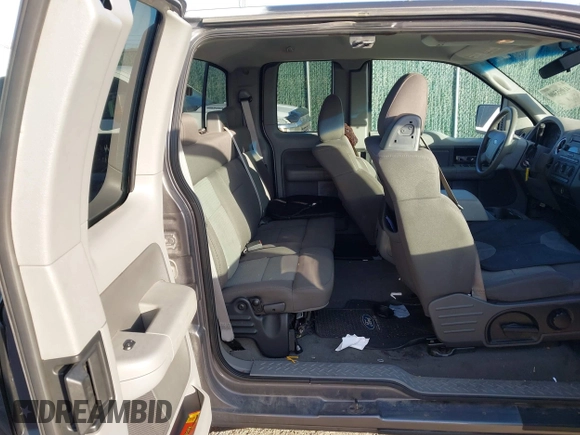 2005 Ford F-150 STX with VIN 1FTRX12W15KD34012, listed as a IAAI auction lot 41095300 with 178,984 mi miles. Bid and sale history available at carsss.com. Image 8.