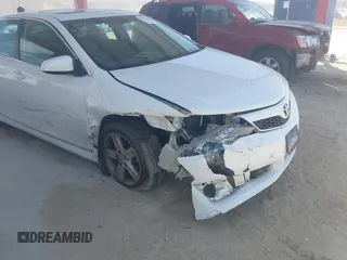 2012 Toyota Camry L with VIN 4T1BF1FK6CU524610, listed as a IAAI auction lot 42113256 with 196,934 mi miles. Bid and sale history available at carsss.com. Image 6.