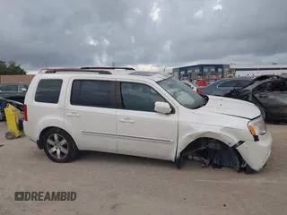 2015 Honda Pilot Touring z VIN 5FNYF4H94FB072907, wystawiony jako IAAI lot #42383169 z przebiegiem 200 040 mil mil oraz . Historia ofert i sprzedaży dostępna na DreamBid. Obrazek 13.