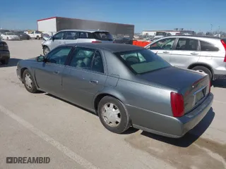 2003 Cadillac DeVille with VIN 1G6KD54Y13U173679, listed as a IAAI auction lot 41686383 with 106,054 mi miles. Bid and sale history available at carsss.com. Image 3.
