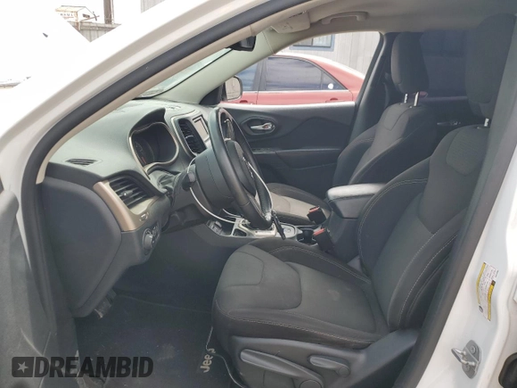 2016 Jeep Cherokee Altitude with VIN 1C4PJLCB4GW216385, listed as a Copart auction lot 57459925 with 154,521 mi miles and Clean title. Bid and sale history available at DreamBid. Image 7.