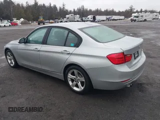 2013 BMW 3 Series 328i xDrive with VIN WBA3B5C58DF594087, listed as a IAAI auction lot 41710362 with 185,994 mi miles. Bid and sale history available at carsss.com. Image 3.