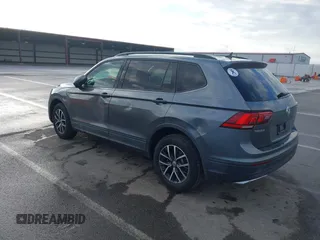 2021 Volkswagen Tiguan S with VIN 3VV1B7AX8MM016874, listed as a IAAI auction lot 41633090 with 76,857 mi miles and . Bid and sale history available at DreamBid. Image 3.