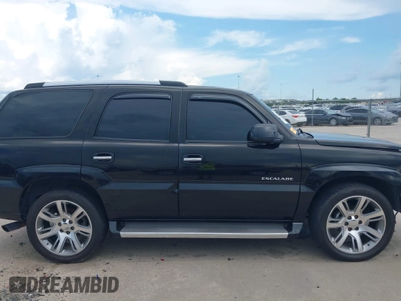2006 Cadillac Escalade with VIN 1GYEC63NX6R148341, listed as a IAAI auction lot 42603913 with 219,673 mi miles and . Bid and sale history available at DreamBid. Image 14.