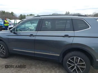 2021 Volkswagen Tiguan SE with VIN 3VV2B7AX6MM054611, listed as a IAAI auction lot 41978323 with 23,029 mi miles and . Bid and sale history available at DreamBid. Image 14.