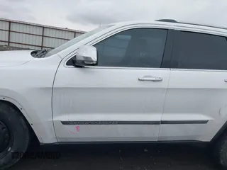 2013 Jeep Grand Cherokee Overland with VIN 1C4RJFCT4DC640553, listed as a IAAI auction lot 41311413 with 146,212 mi miles. Bid and sale history available at carsss.com. Image 15.