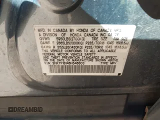 2006 Honda Pilot LX with VIN 2HKYF18146H546803, listed as a IAAI auction lot 41533192 with 218,754 mi miles. Bid and sale history available at carsss.com. Image 9.