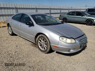 2001 Chrysler LHS z VIN 2C3HC56G11H643759, wystawiony jako Copart lot #70924974 z przebiegiem 124 263 mil mil oraz Tytuł czysty. Historia ofert i sprzedaży dostępna na DreamBid. Obrazek 4.