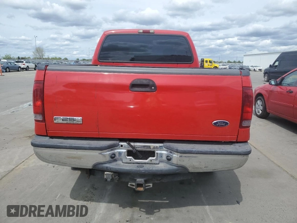 2005 Ford F-250 XL with VIN 1FTSX21P15EA76932, listed as a Copart auction lot 52053355 with 134,955 mi miles and Salvage title. Bid and sale history available at DreamBid. Image 6.
