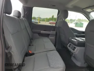 2024 Ford F-150 Lightning Flash z VIN 1FT6W3L77RWG28974, wystawiony jako Copart lot #60819395 z przebiegiem 7 025 mil mil oraz Szkoda całkowita • Salvage title. Historia ofert i sprzedaży dostępna na DreamBid. Obrazek 10.