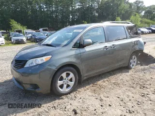 2014 Toyota Sienna LE AAS with VIN 5TDKK3DC9ES424841, listed as a Copart auction lot 59098365 with 168,427 mi miles and Clean title. Bid and sale history available at DreamBid. Image 1.