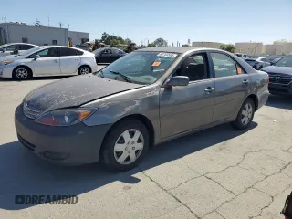2004 Toyota Camry LE with VIN 4T1BE32KX4U931772, listed as a Copart auction lot 60703505 with 143,381 mi miles and Salvage title. Bid and sale history available at DreamBid. Image 1.