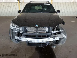 2018 BMW X5 xDrive40e iPerformance with VIN 5UXKT0C53J0W02429, listed as a Copart auction lot 51874485 with 57,480 mi miles and Salvage Title. Bid and sale history available at carsss.com. Image 5.