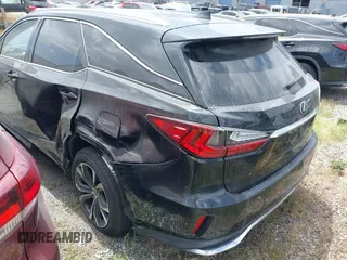2020 Lexus RX with VIN JTJHZKEA3L2016365, listed as a IAAI auction lot 41615430 with 33,853 mi miles. Bid and sale history available at carsss.com. Image 3.