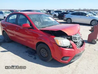 2011 Kia Rio LX with VIN KNADH4A34B6848891, listed as a IAAI auction lot 41678155 with 152,021 mi miles. Bid and sale history available at carsss.com. Image 1.