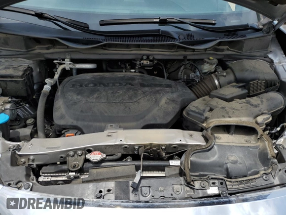 2022 Honda Odyssey Touring с VIN 5FNRL6H82NB009321, выставлен на аукционе Copart как лот 59058535 с пробегом 88 073 миль миль и Списание • Salvage title. История ставок и продаж доступна на DreamBid. Изображение 12.