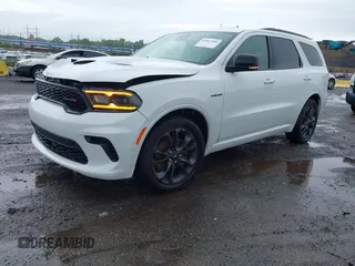 2024 Dodge Durango R/T Plus z VIN 1C4SDJCT4RC228085, wystawiony jako IAAI lot #42047084 z przebiegiem 6 458 mil mil oraz . Historia ofert i sprzedaży dostępna na DreamBid. Obrazek 2.