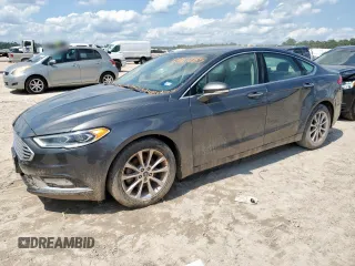 2017 Ford Fusion SE z VIN 3FA6P0HD2HR132126, wystawiony jako Copart lot #59161285 z przebiegiem 112 297 mil mil oraz Czysty tytuł • Clean title. Historia ofert i sprzedaży dostępna na DreamBid. Obrazek 1.