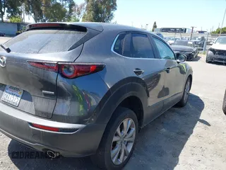 2021 Mazda CX-30 Select z VIN 3MVDMABL3MM233701, wystawiony jako IAAI lot #42086778 z przebiegiem Nie podano mil oraz . Historia ofert i sprzedaży dostępna na DreamBid. Obrazek 4.