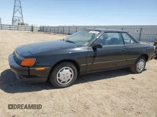 1989 Toyota Celica z VIN JT2ST67C8K7337876, wystawiony jako Copart lot #57918785 z przebiegiem 16 862 mil mil oraz Tytuł czysty. Historia ofert i sprzedaży dostępna na DreamBid. Obrazek 1.